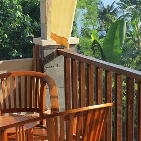 Bali Sari Homestay آميدْ الغرفة الصورة