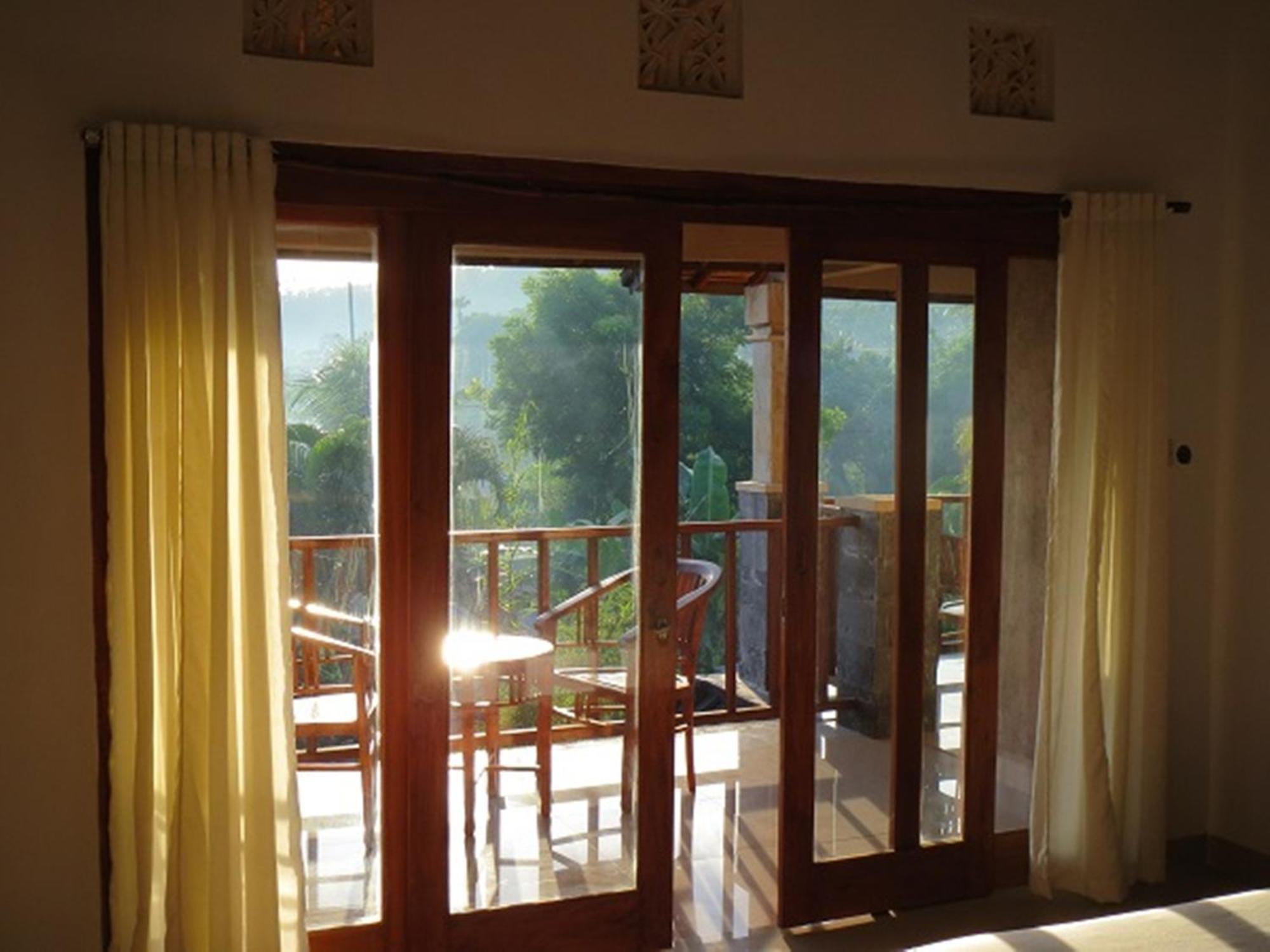 Bali Sari Homestay آميدْ الغرفة الصورة
