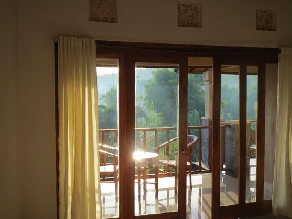 Bali Sari Homestay آميدْ الغرفة الصورة